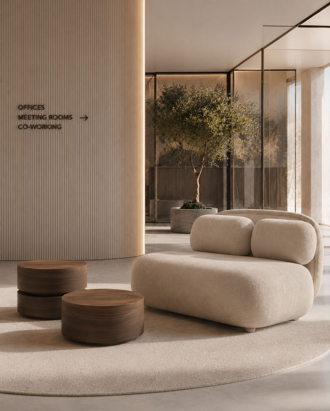 Workplace lobby with curved walls, integrated lighting, and lounge seating