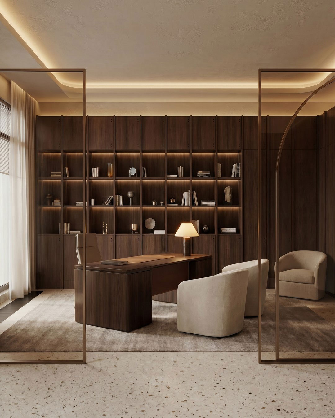 Private office framed with bronze-toned glass partitions